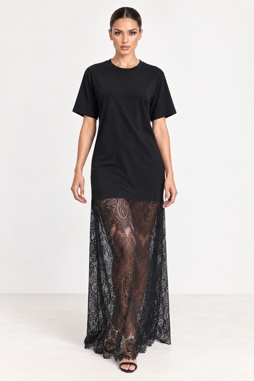Vestido preto com barra longa em renda — vista frontal na modelo